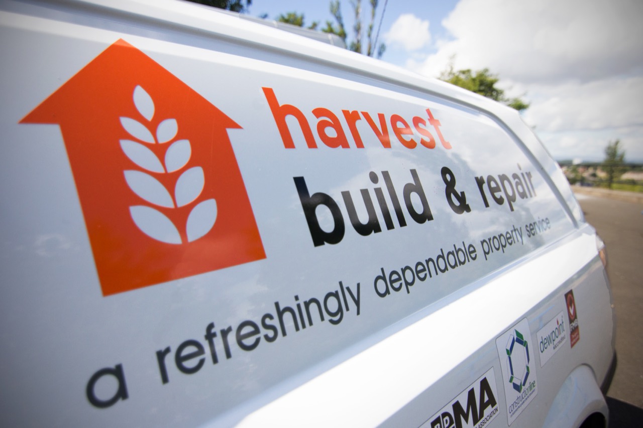 A Harvest Contracts van outside a commercial property